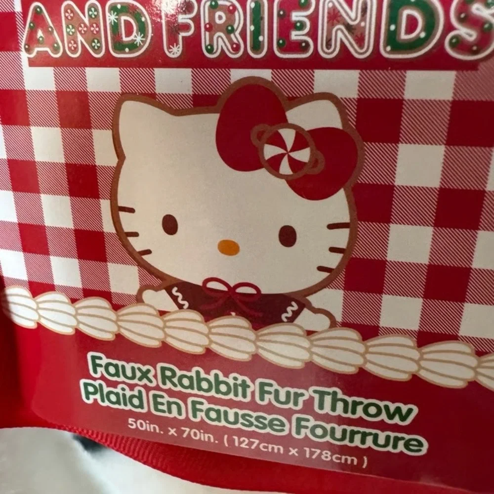 First offer gets it. Hello Kitty Christmas candy cane blanket. - Picture 2 of 2